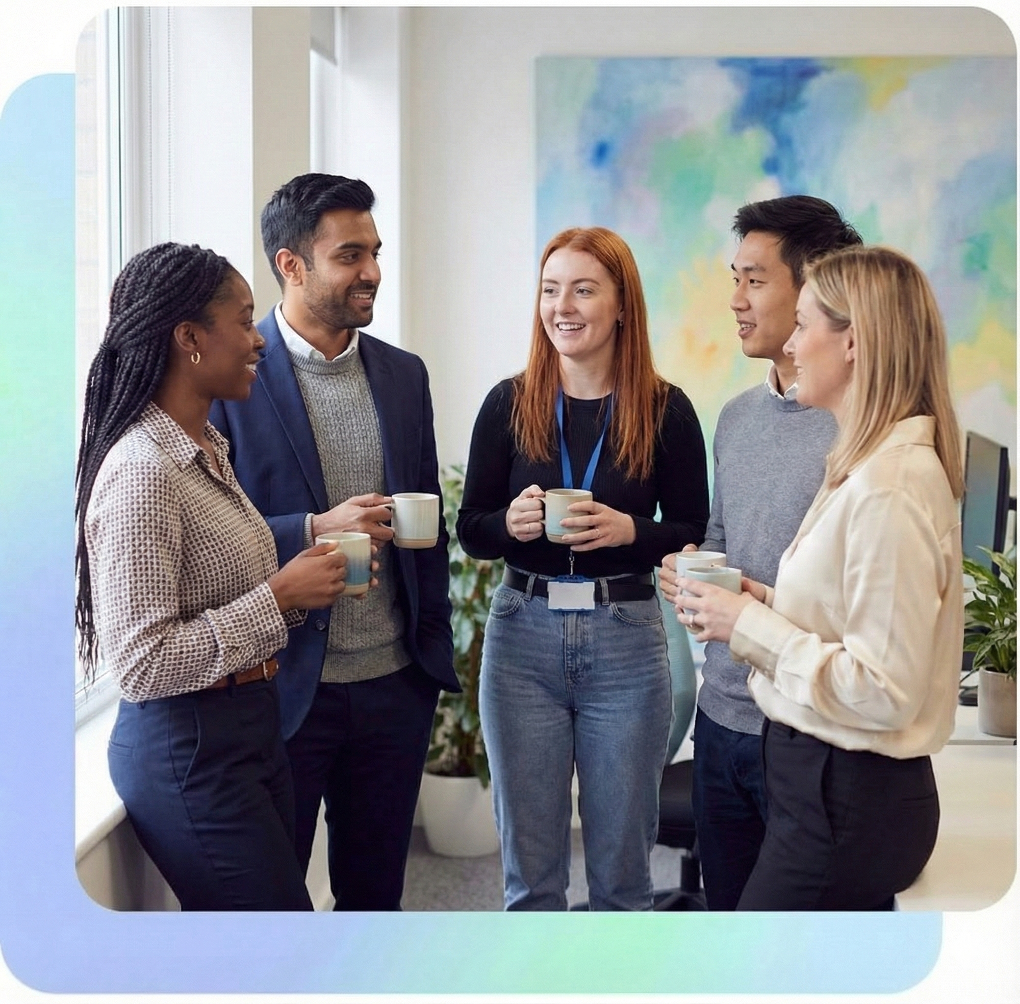 Diverse group of colleagues laughing together